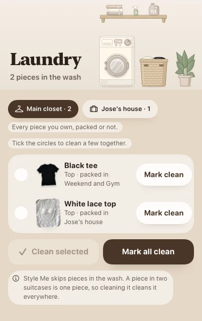Laundry screen showing two pieces in the wash with controls to mark them clean.